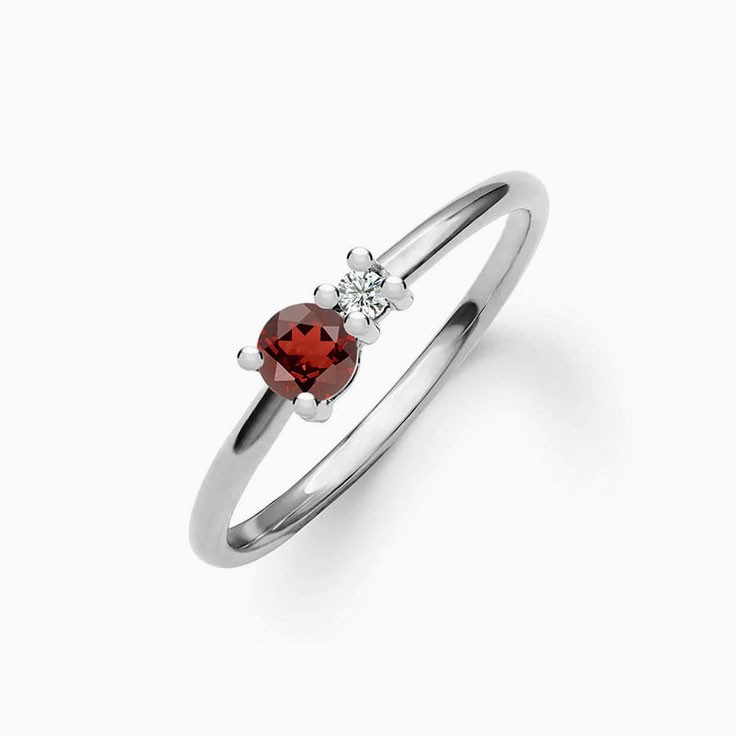 Round Garnet And Diamond Ring