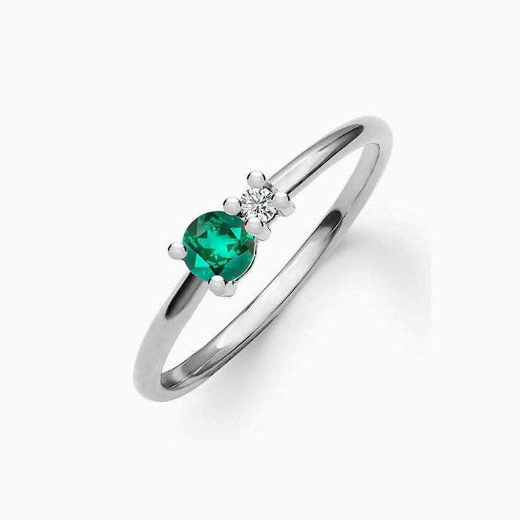 Round Emarald And Diamond Ring