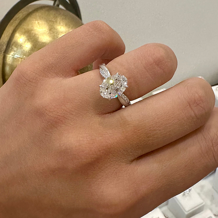 Lab oval diamond on a twisted band engagement ring