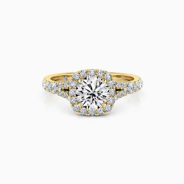 Round brilliant with a cushion halo engagement ring