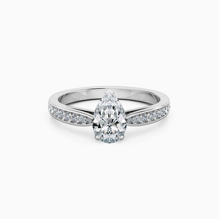 Pear cut diamond engagement ring on a diamond band