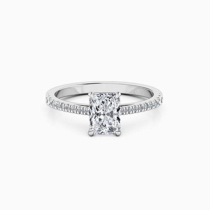 Radiant cut diamond engagement ring on a diamond band