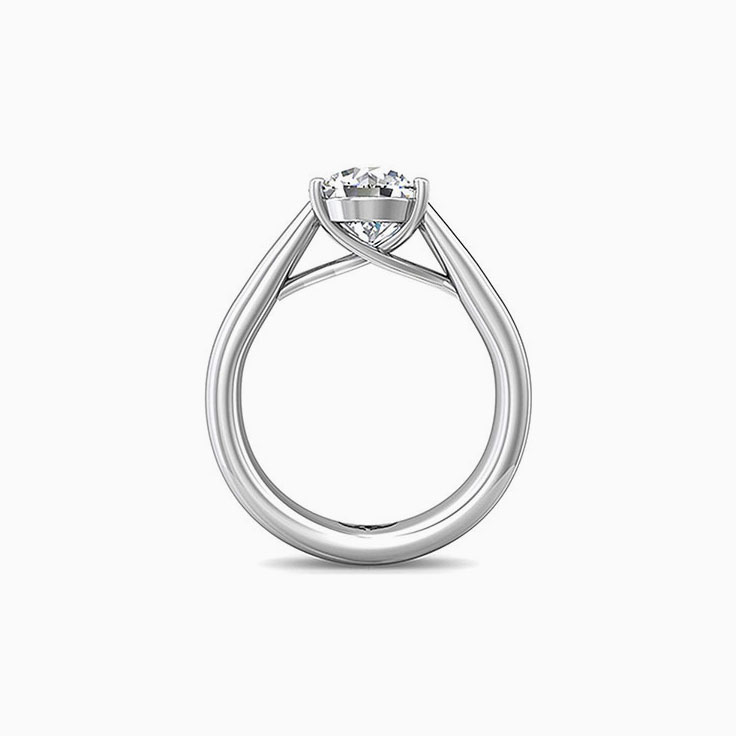 Classic solitaire round diamond engagement ring