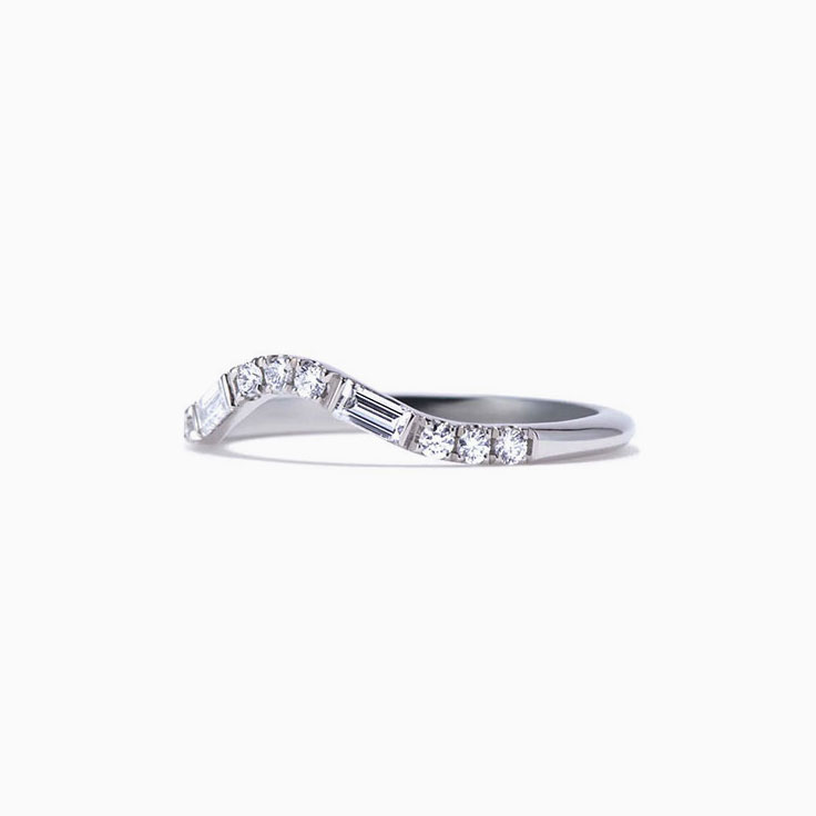 Baguette and round curve ring