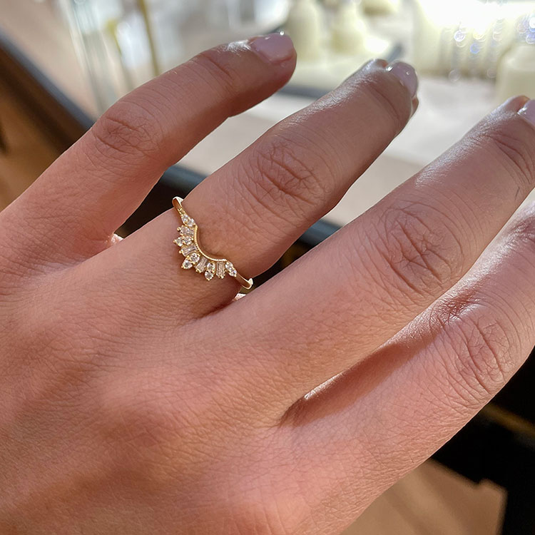 Curved baguette wedding band